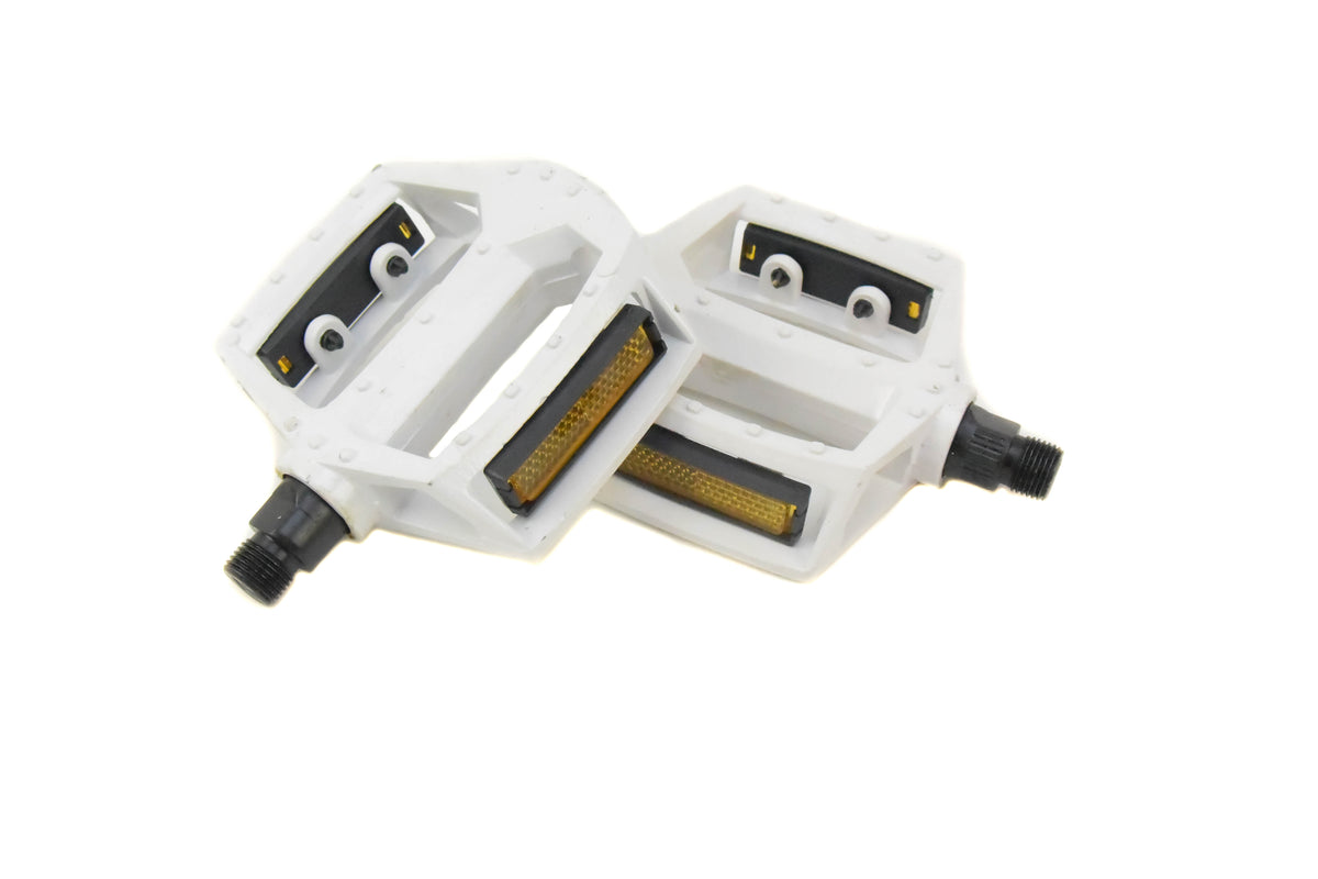 white bicycle pedals